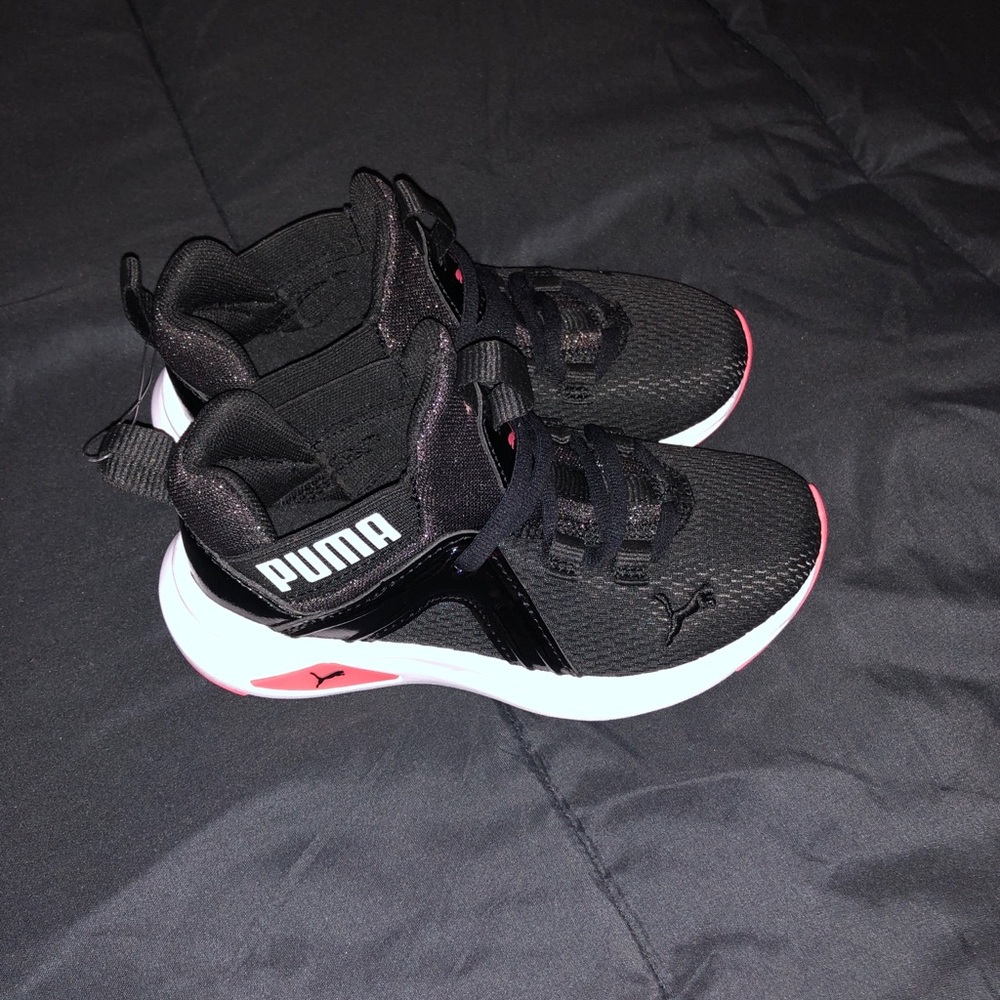 Size 12C Black Kid Pumas. Girls.
